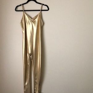 Metallic gold body suite.